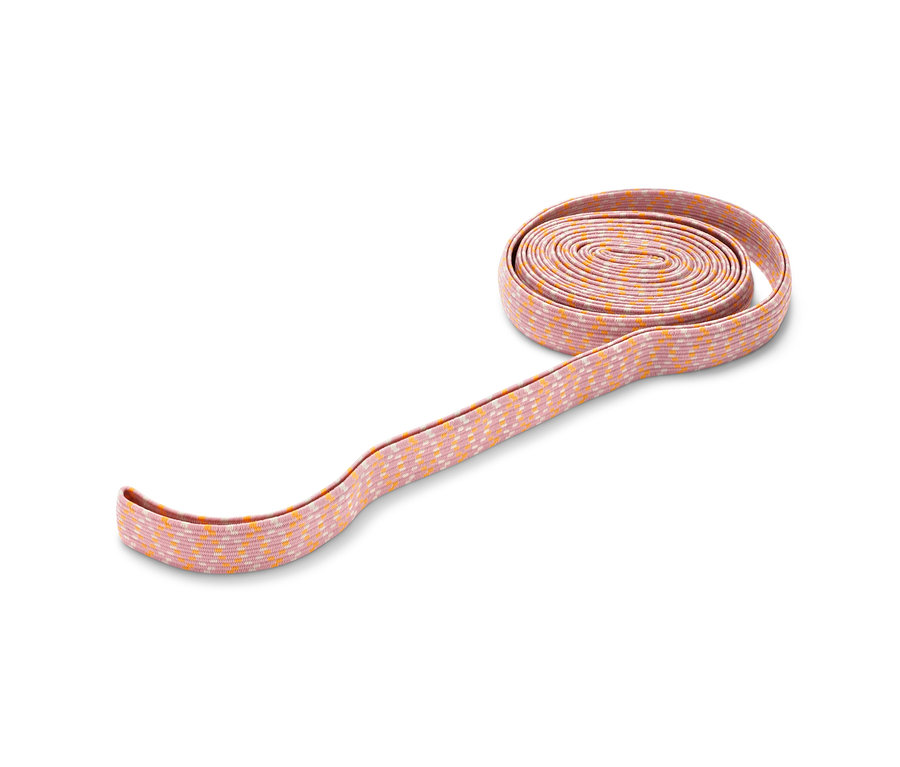 Egy rózsaszín-narancssárga, feltekert gumikötél játék.