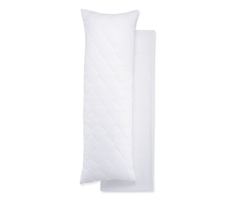 Két fehér párna oldalt fekvőknek, egyikük steppelt.