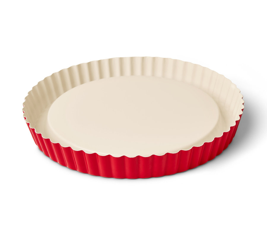 Egy piros gyümölcstorta sütőforma.