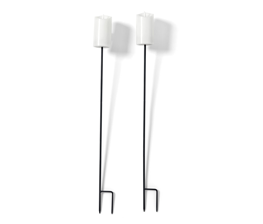 Két LED-es valódi viasz fáklya fekete rudakkal fehér háttér előtt.