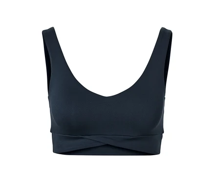 Egy sötétkék női bustier sportmelltartó részlete.
