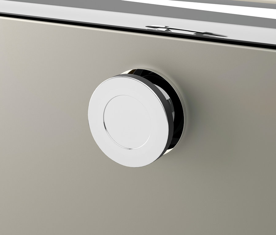 Egy fiók részlete ezüst, kerek fogantyúval.