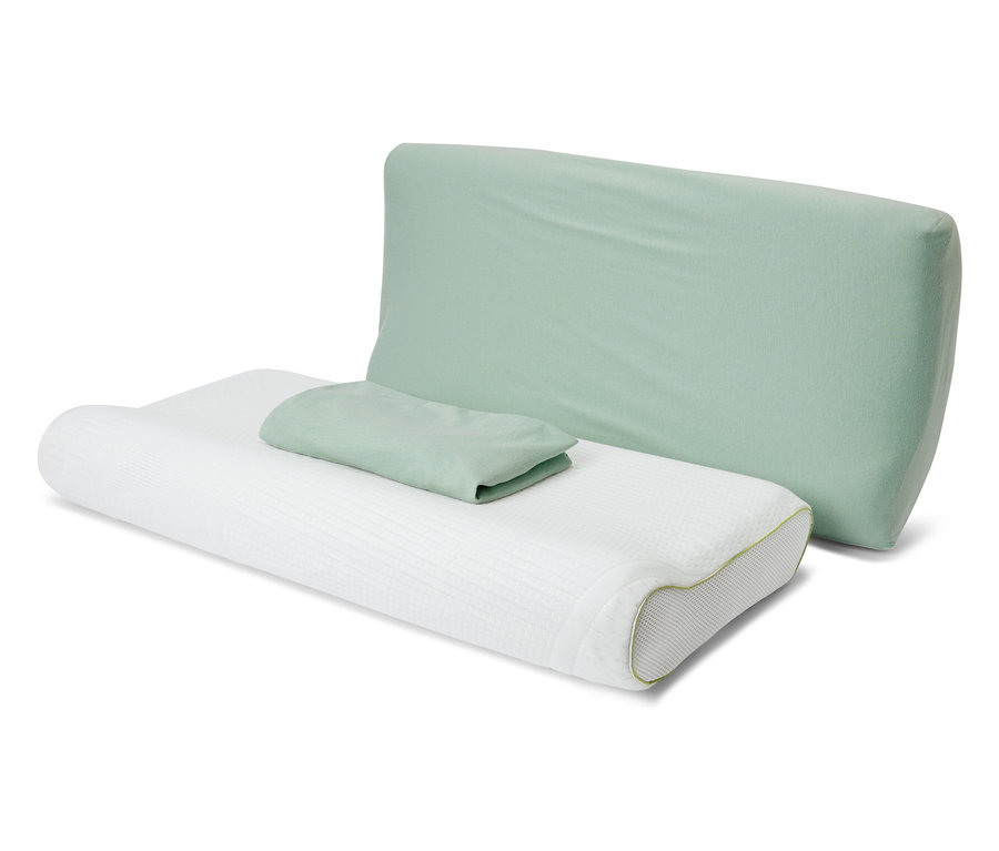 Két zöld jersey nyakpárnahuzat fekszik egy fehér párnán.