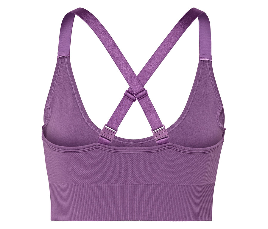 Egy lila sportmelltartó részletgazdag képe, hátul keresztezett pántokkal.