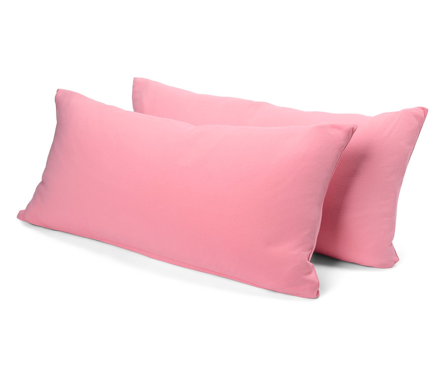 Két rózsaszín párna egymáson.