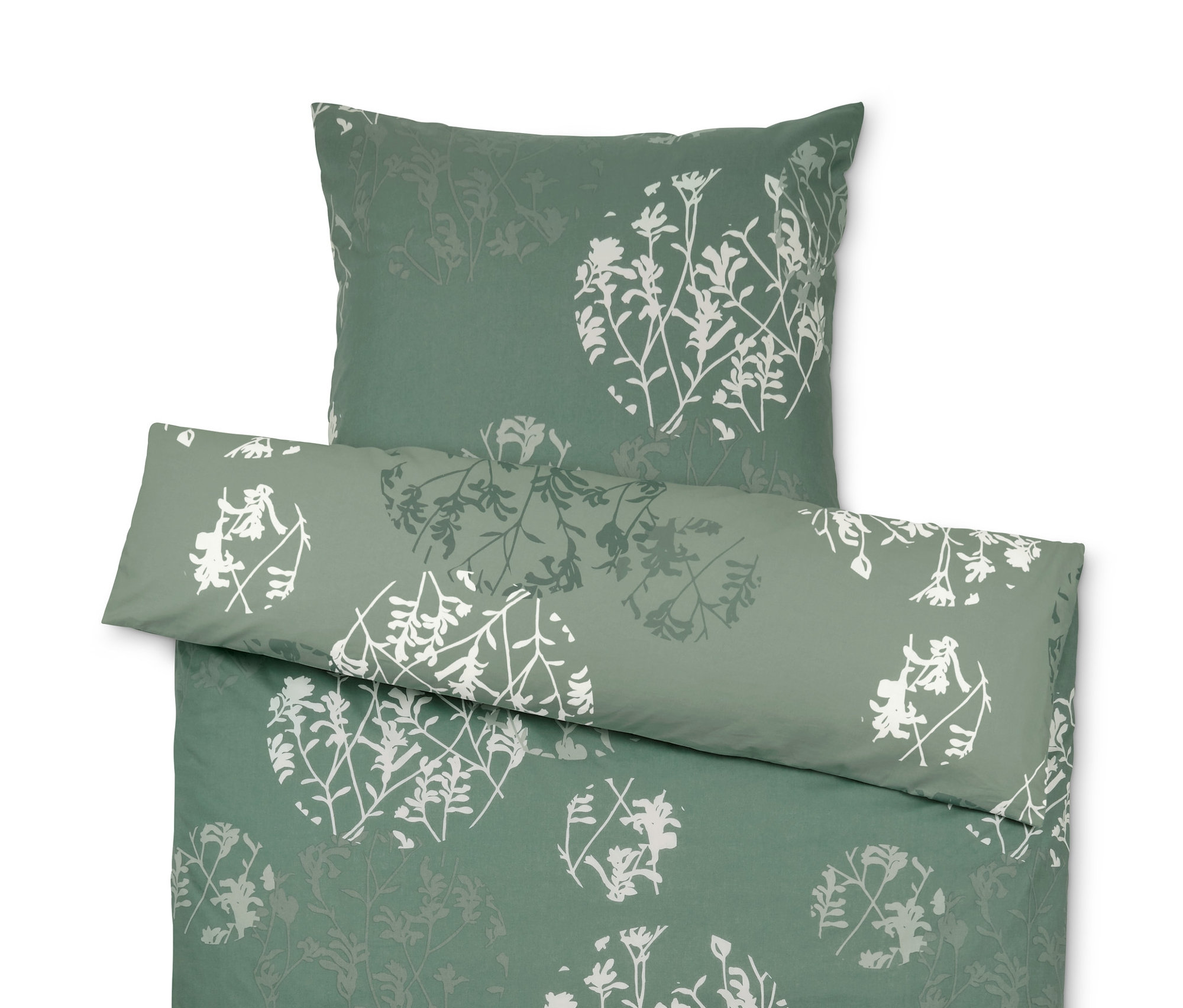 Zöld, mintás, kétoldalas renforcé ágynemű egyszemélyes és kétszemélyes méretben, fehér virágmintával.