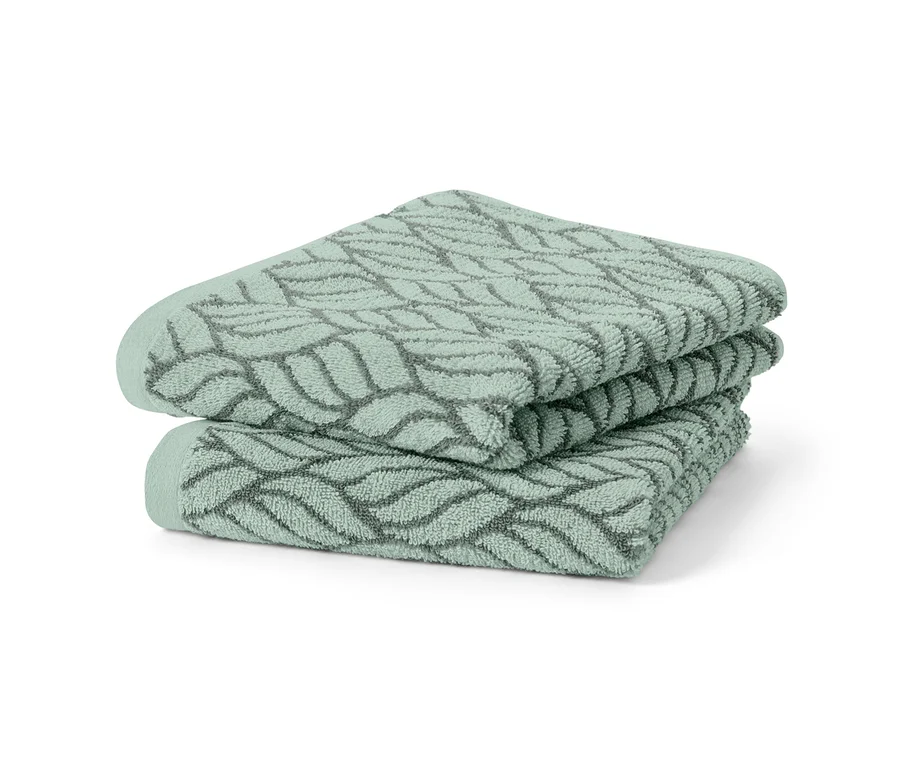 Két jacquard törölköző egymásra hajtva.
