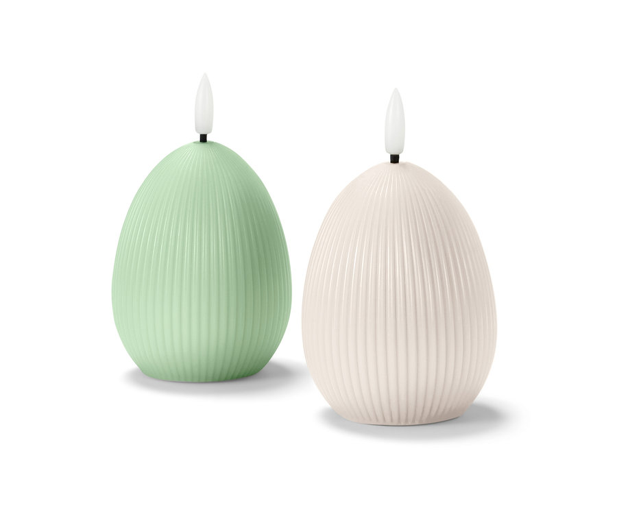 Két tojás alakú LED-es valódi viaszgyertya.