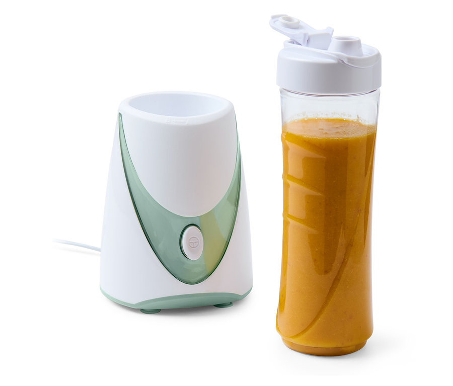 Smoothie készítő, 250 W, narancssárga smoothie-val töltött tartállyal.