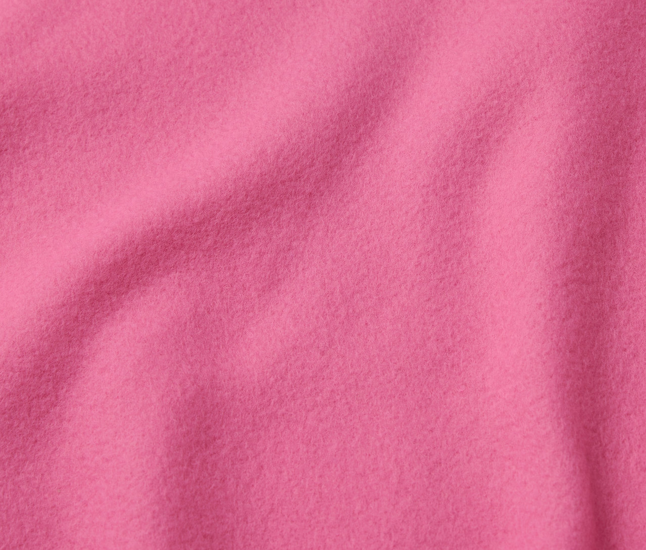 Rózsaszín anyag finom textúrával.