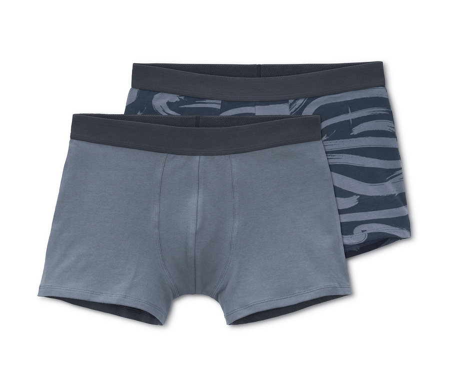 Két férfi boxer alsónadrág: egy kék és egy mintás.