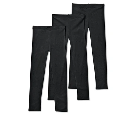 Három fekete leggings egymás mellett fekszik.