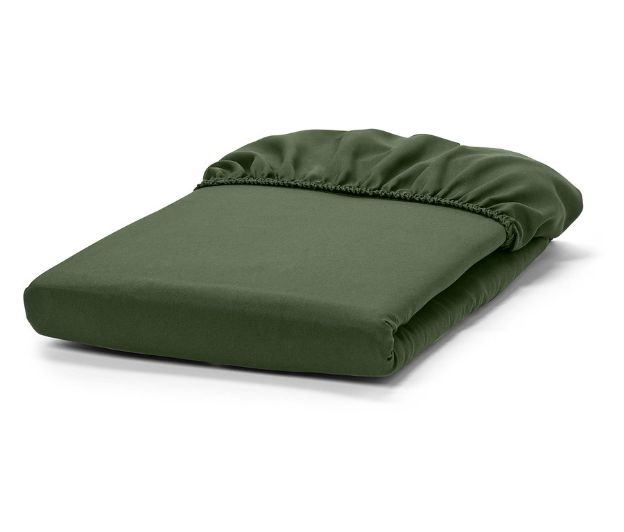 Összehajtott zöld gumis lepedő.