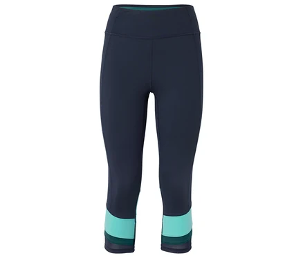 Tengerészkék, háromnegyedes leggings türkizkék blokkal a lábszár végén.