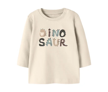 Krém színű, hosszú ujjú gyerek póló többszínű „DINOSAUR” felirattal.