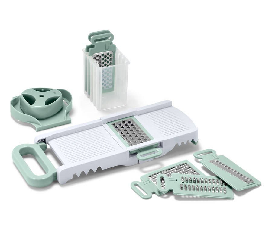 Konyhai szeletelők és reszelőkészlet fehér vázzal és világoszöld részletekkel.