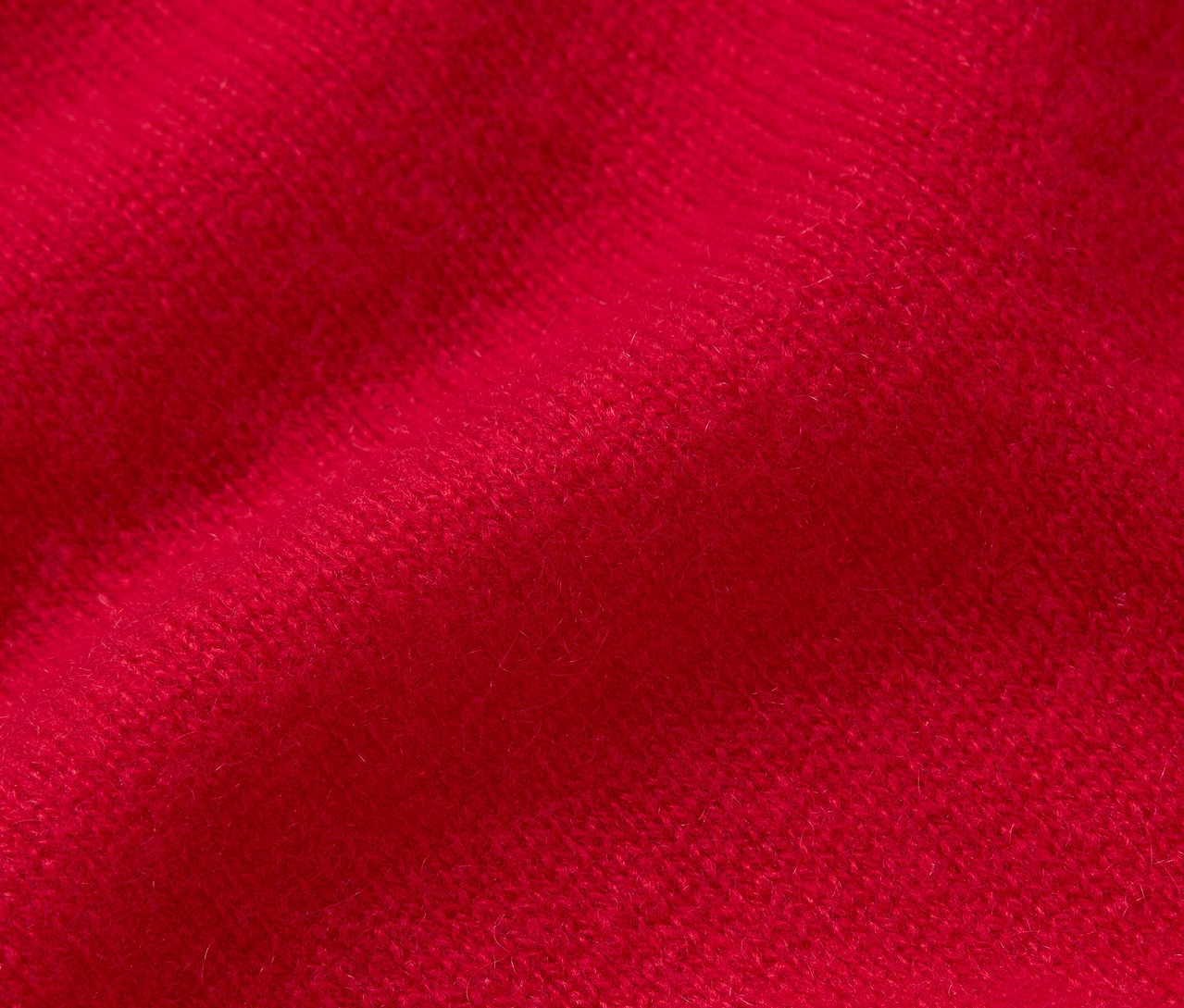 Egy vörös szövet közeli képe.