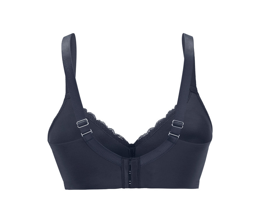 Kék, merevítő nélküli, puha melltartó hátulnézete, állítható pántokkal.