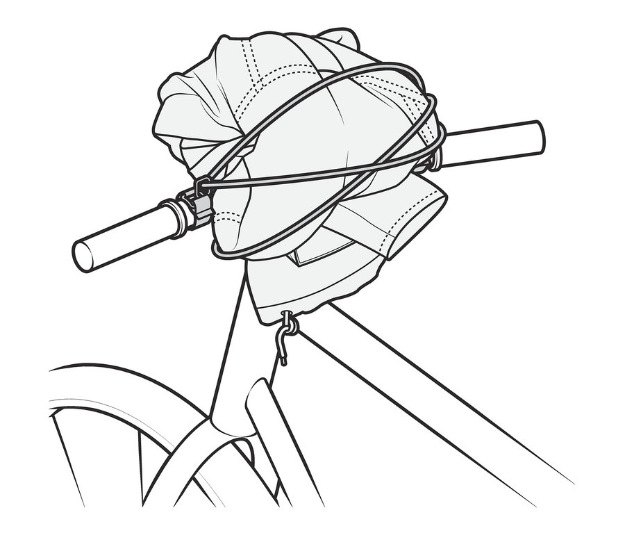 Kerékpár kormány csomagrögzítő pánttal rögzítve.