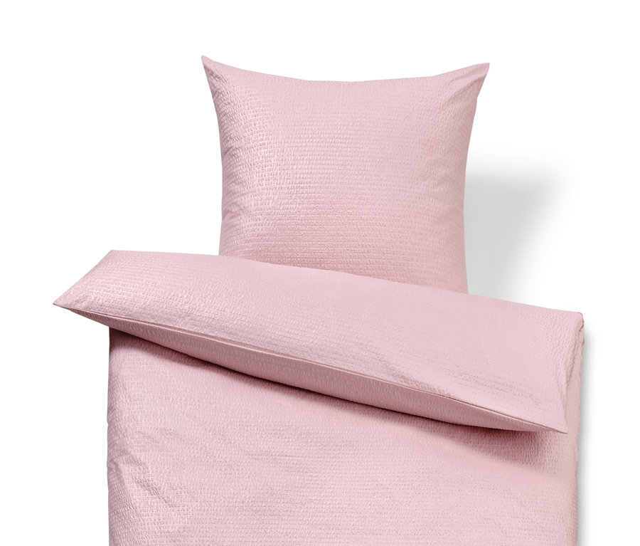 Rózsaszín krepp ágynemű kétszemélyes méretben, párnával.