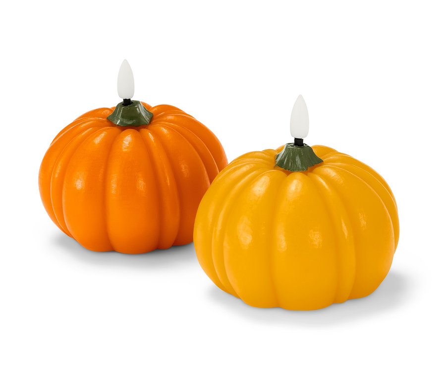 Két sütőtök alakú LED-es valódi viaszgyertya.