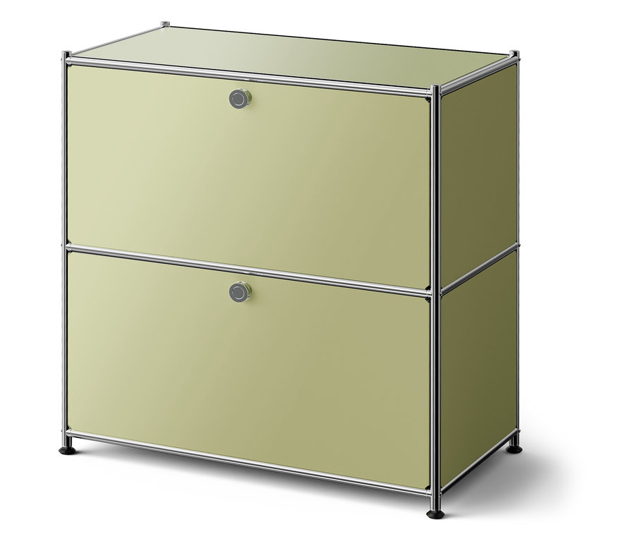 Zöld szekrény két fiókkal és ezüst kerettel.