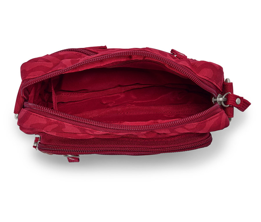 Egy nyitott, üres, piros kézitáska közeli képe.