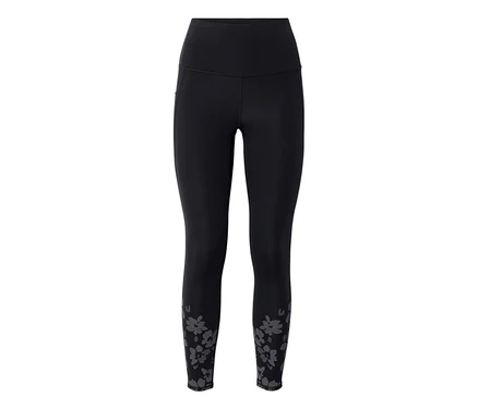 Fekete »ActivePower« sportleggings magas derékkal és szürke virágmintával a bokákon.