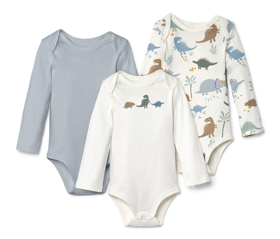 Három hosszú ujjú body: egy szürke, egy fehér dinoszauruszokkal, és egy fehér dinoszaurusz mintával.