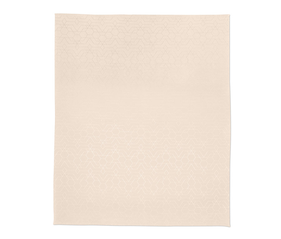 Egy krémszínű, geometrikus mintás jacquard asztalterítő.