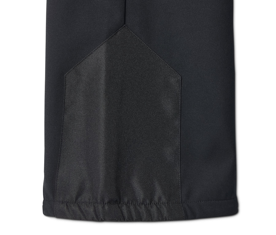 Egy fekete női softshell jet sínadrág részlete.