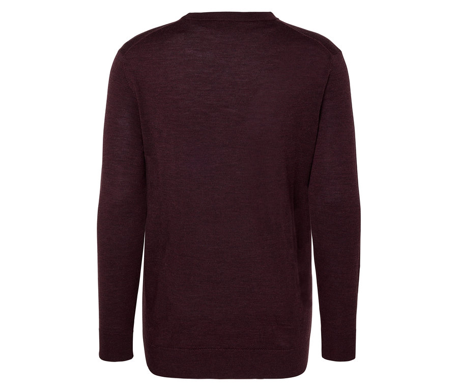 Közeli kép egy melírozott sötétvörös merinó pulóverről.