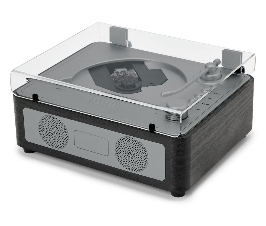 Egy CD/Bluetooth® hangszóró átlátszó fedéllel egy fehér felületen áll.