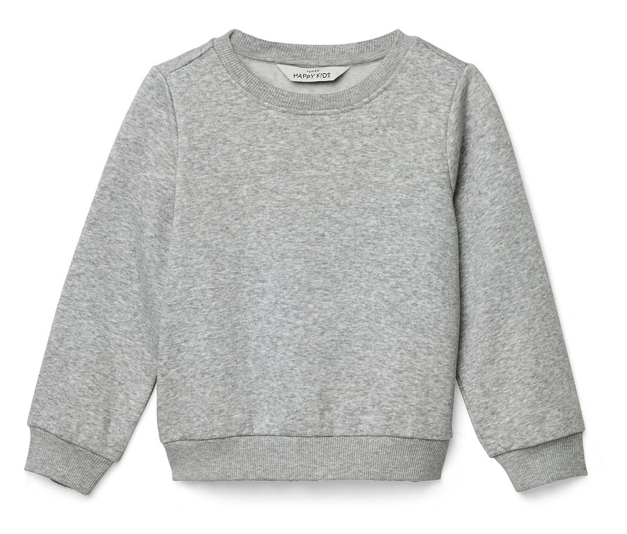 Szürke pulóver fekszik fehér háttéren.