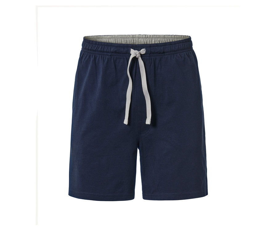 Sötétkék pizsamanadrág egy 4 részes pizsama szettből, szürke húzózsinórral a deréknál.