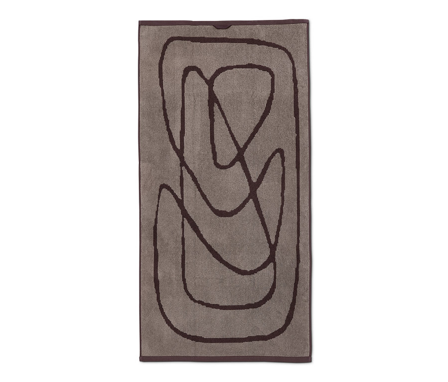 Barna jacquard fürdőlepedő absztrakt barna mintával.