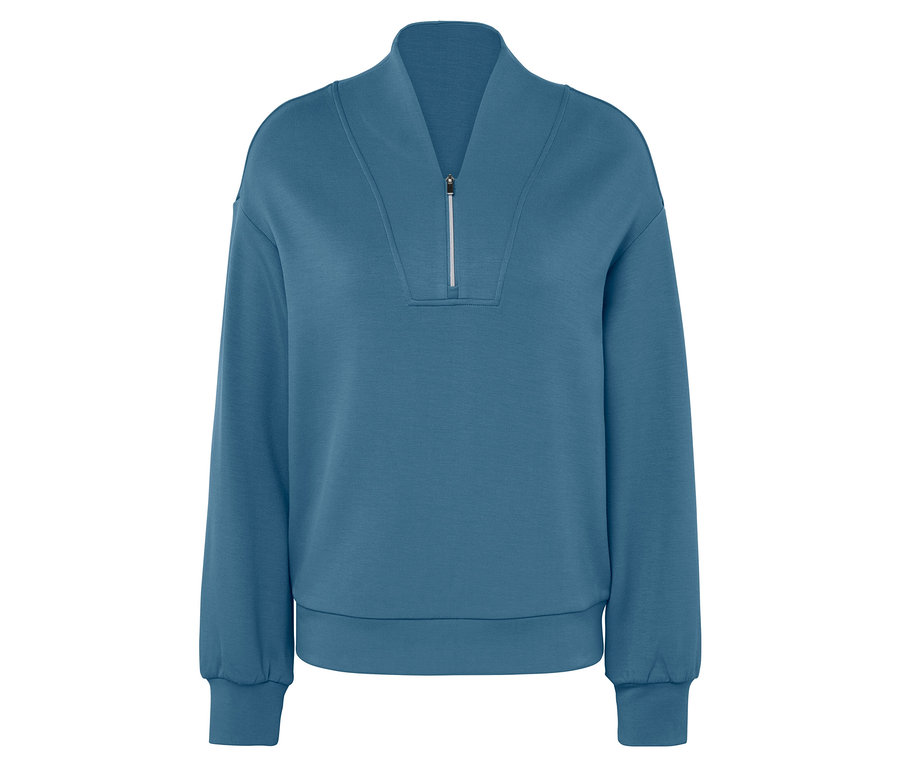 Kék, hosszú ujjú pulóver rövid cipzárral.