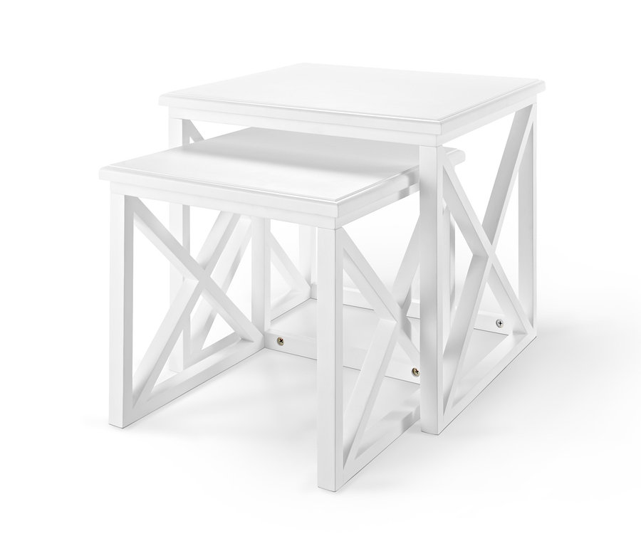 Két fehér dohányzóasztal, egyik a másik alatt.