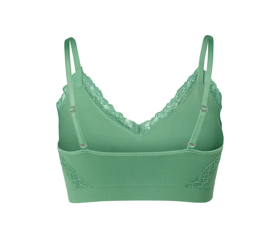 Egy zöld, seamless bustier melltartó részletgazdag képe csipkés szegéllyel.