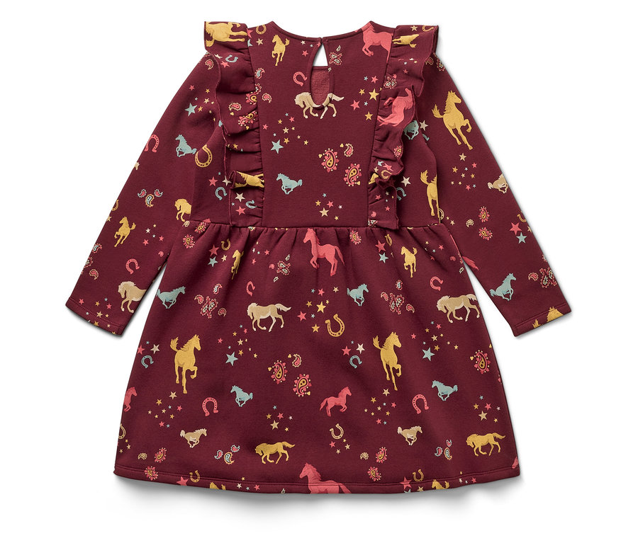 Bordó, hosszú ujjú ruha fodrokkal, lovak, patkók és csillagok mintájával.