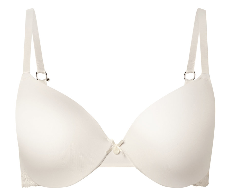 Elefántcsontszínű, merevítős, állítható pántos melltartó fehér háttér előtt középre igazítva.