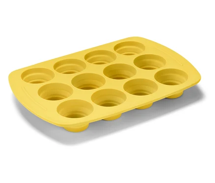 Sárga szilikon muffin forma tizenkét, téglalap alakban elrendezett mélyedéssel.