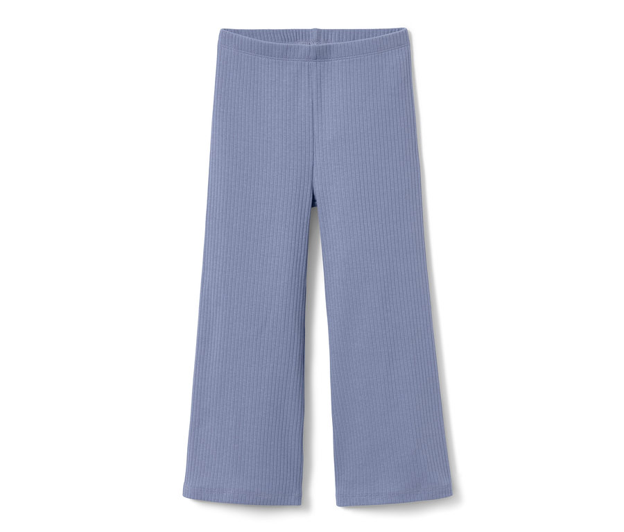 Egy lila kislány bőszárú leggings, bordás, fehér háttérrel.
