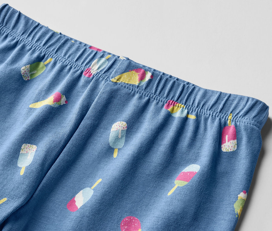 Kék, háromnegyedes gyerek leggings fagylalt mintával.