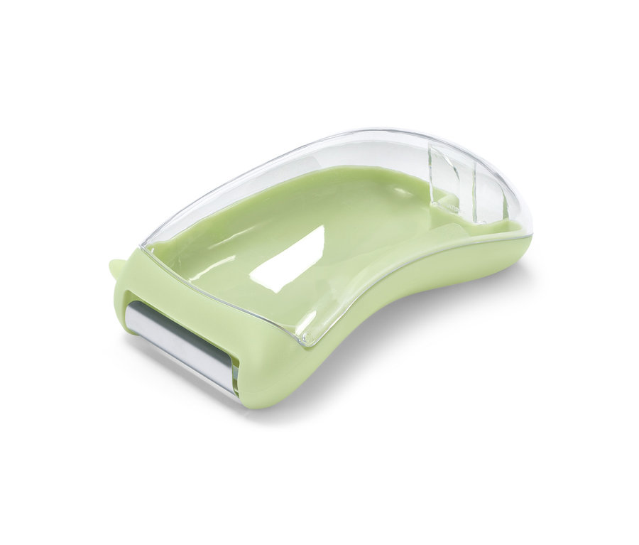 Egy világoszöld univerzális hámozó gyűjtőtartállyal és átlátszó műanyag fedéllel.