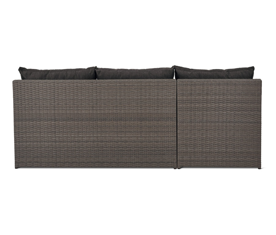 A szürke kerti polyrattan kanapé, kihúzható részlete.