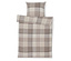 Ágynemű és párna kockás mintával, bézs színben.
