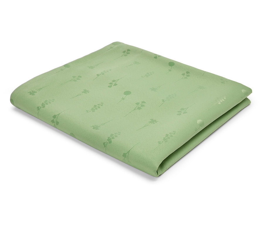 Világoszöld textilszalvéta szár és virág mintával.