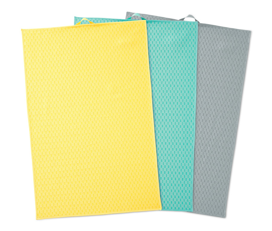 Egy sárga, egy türkiz és egy szürke 3 kétoldalas konyharuha szettben.