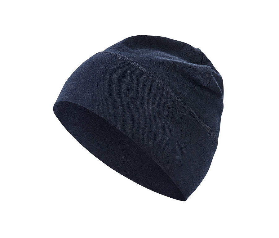 Egy sötétkék, merinógyapjú unisex sapka közelről, fehér háttér előtt.